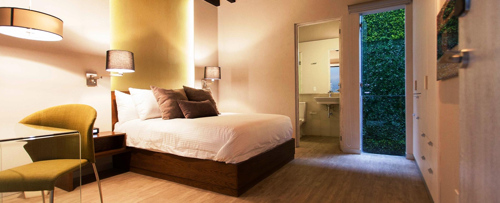 Othelo Boutique Hotel Mexico Leon Exterior photo A bedroom at the Hotel Kabuki